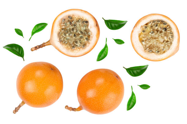 istock Granadilla or yellow passion fruit with leaf isolated on white background. Top view. Flat lay 1161777625