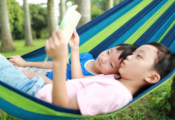 istock Little boy have a rest in a hammock 1161779976