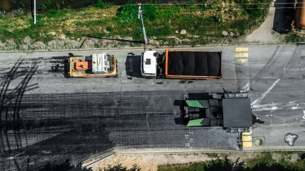 istock Aerial view on the new asphalt road under construction 1161781587