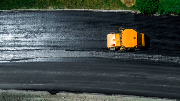 istock Aerial view on the new asphalt road under construction 1161781926