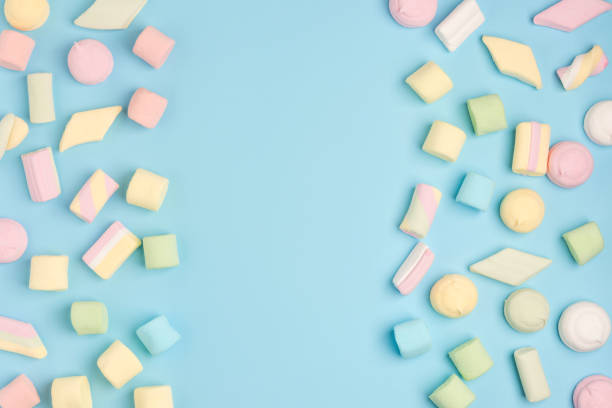 istock Mini marshmallows on trendy pastel blue background. Flat lay, copy space 1161789968