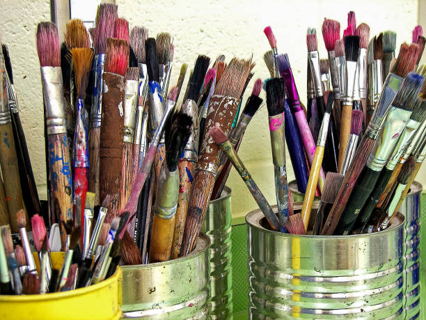 istock used artist paint brushes in can 1161790083