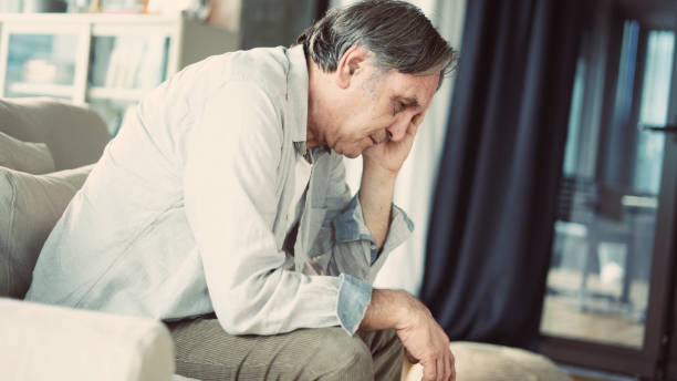 istock Portrait of thoughtful senior man 1161792403