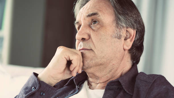 istock Portrait of thoughtful senior man 1161792443