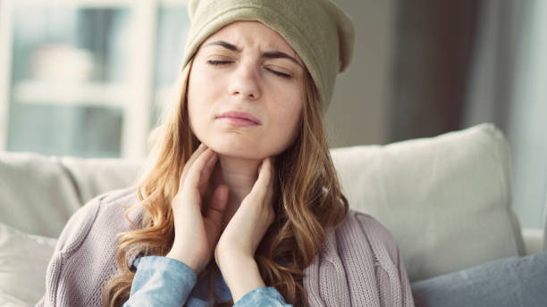 Young woman suffering from cold stock photo