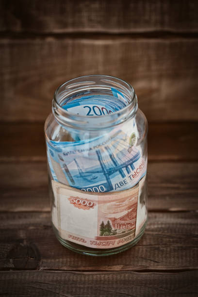 istock Russian banknotes in a glass jar 1161796124