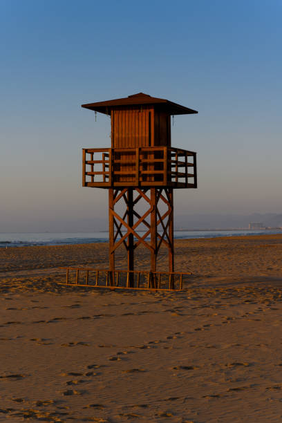 istock Lifeguard watchtower in morning sunlight 1161800261