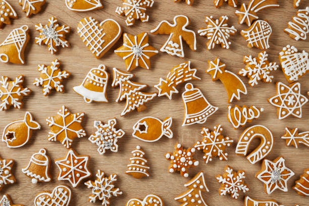 istock Christmas background with gingerbreads on wooden table 1161803686