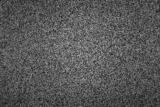 Dark black and white television static analog TV static - retro crt television - off air - white noise television static photos stock pictures, royalty-free photos & images