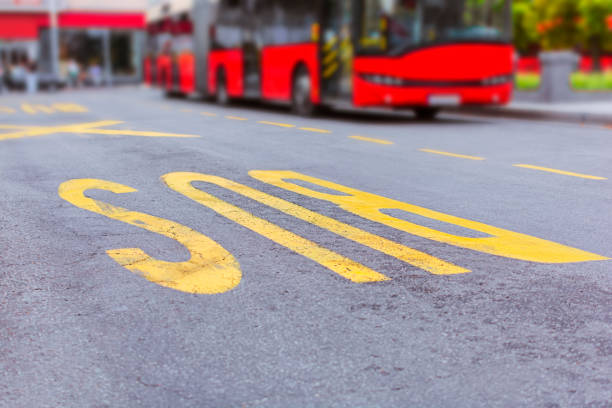 istock Red public transportation bus on bus stop at street 1161807909
