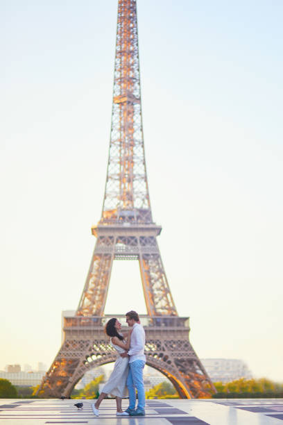 istock Happy romantic couple in Paris, near the Eiffel tower 1161811466