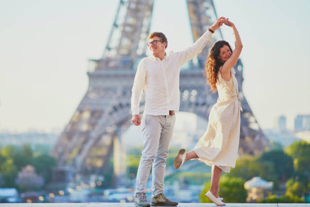 istock Happy romantic couple in Paris, near the Eiffel tower 1161811524