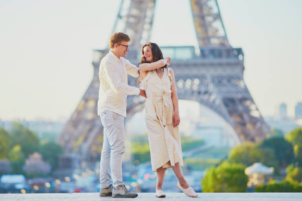 istock Happy romantic couple in Paris, near the Eiffel tower 1161811529