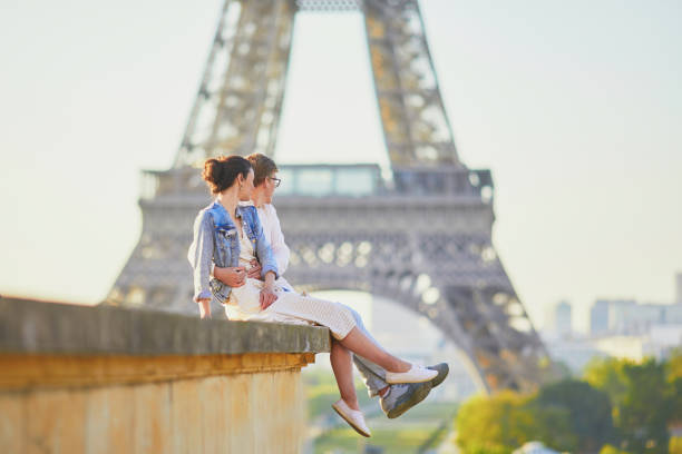 istock Happy romantic couple in Paris, near the Eiffel tower 1161811589