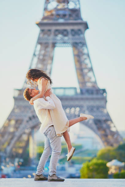 istock Happy romantic couple in Paris, near the Eiffel tower 1161811601