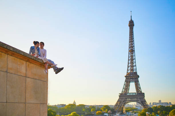 istock Happy romantic couple in Paris, near the Eiffel tower 1161811609