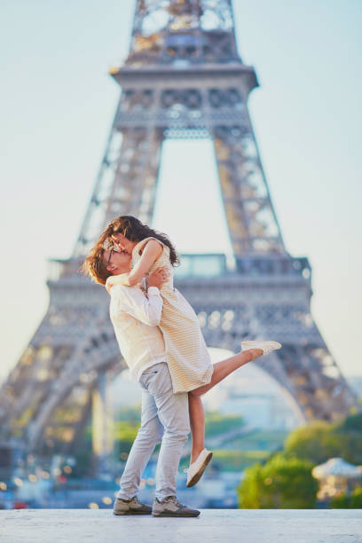 istock Happy romantic couple in Paris, near the Eiffel tower 1161811627