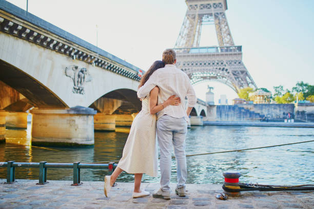istock Happy romantic couple in Paris, near the Eiffel tower 1161811648