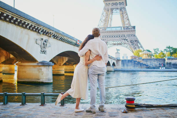 istock Happy romantic couple in Paris, near the Eiffel tower 1161811666