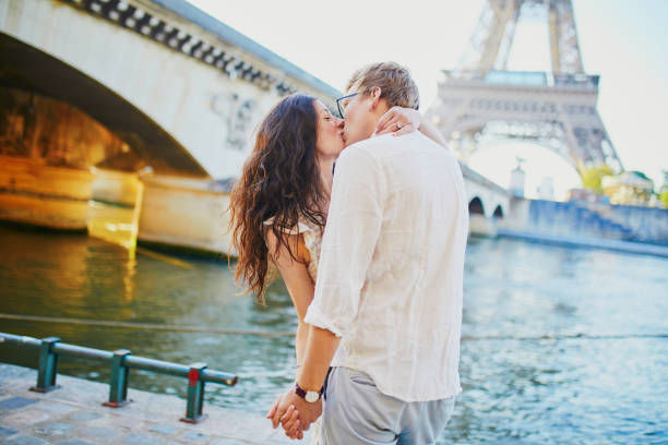 istock Happy romantic couple in Paris, near the Eiffel tower 1161811672