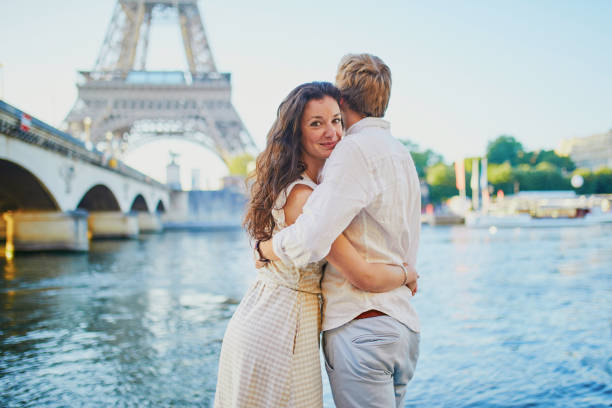 istock Happy romantic couple in Paris, near the Eiffel tower 1161811692
