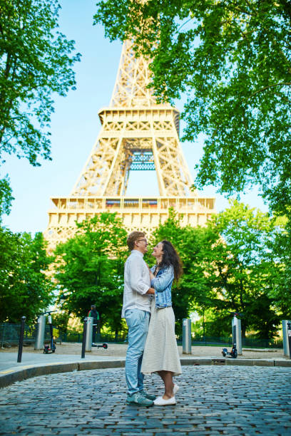 istock Happy romantic couple in Paris, near the Eiffel tower 1161812615