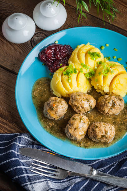 istock Meatballs with potatoes in dill sauce. 1161812630