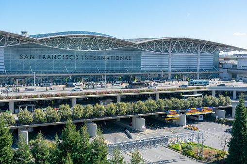 San Francisco, California, USA - January 21, 2019 : Exterior view of International terminal of San Francisco SFO International Airport. Cars, buses and shuttles pick up and drop off Silicon Valley major airport passengers