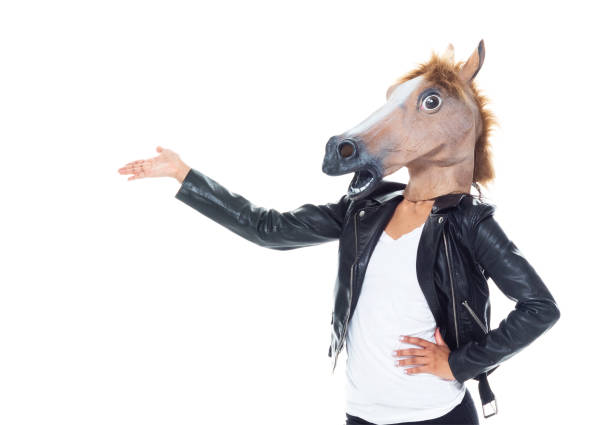Bautiful woman wearing a leather jacket and wearing a horse head