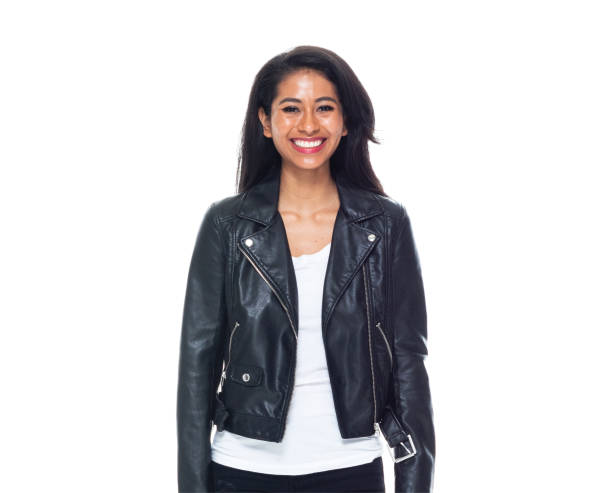 istock Beautiful Latino female wearing a leather jacket - hands by side 1161815395