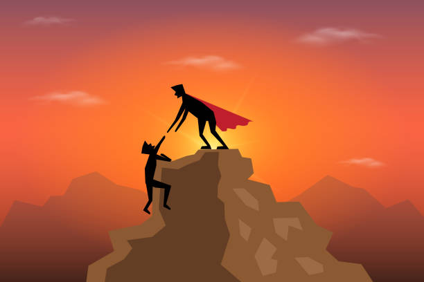 istock Businessman holding partner's hand on climbing to top 1161816616