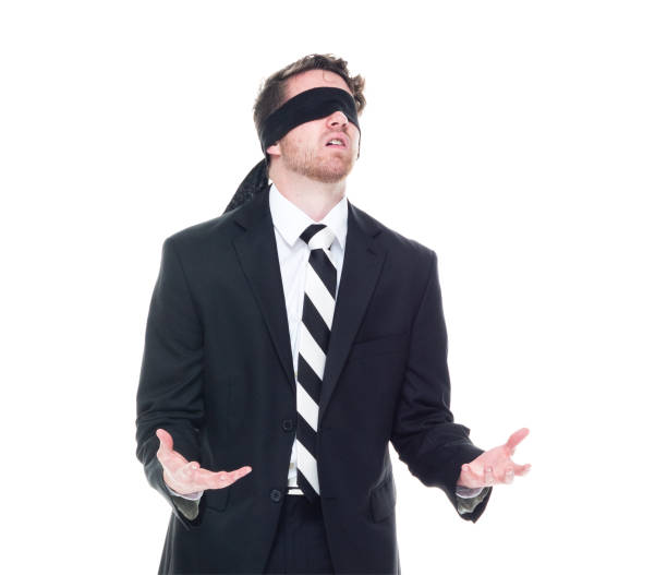 istock Handsome businessman wearing a black suit - is wearing a blindfold 1161817444