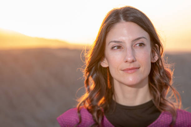 istock Woman in the desert at sunrise 1161820321