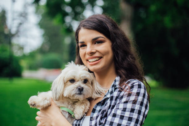 istock Happy girl with a dog 1161822503