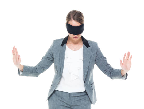 istock Businesswoman wearing blindfold 1161823473