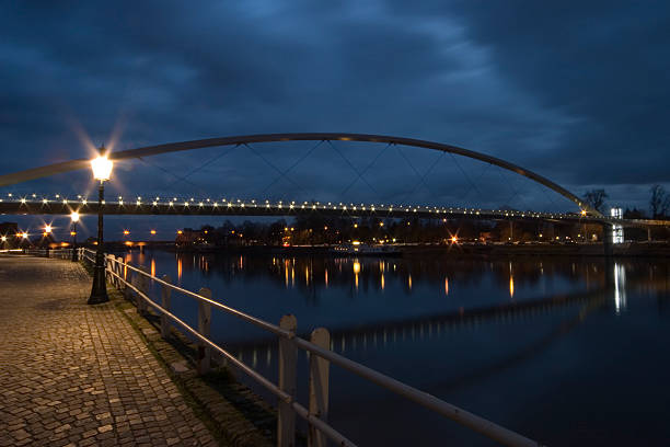 istock reflection of a bridge in the Meuse river at Maastricht 116182400