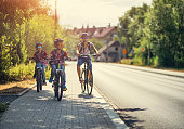 Kids riding bikes to school