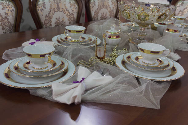 Plates and glasses on the table. Luxurious serving