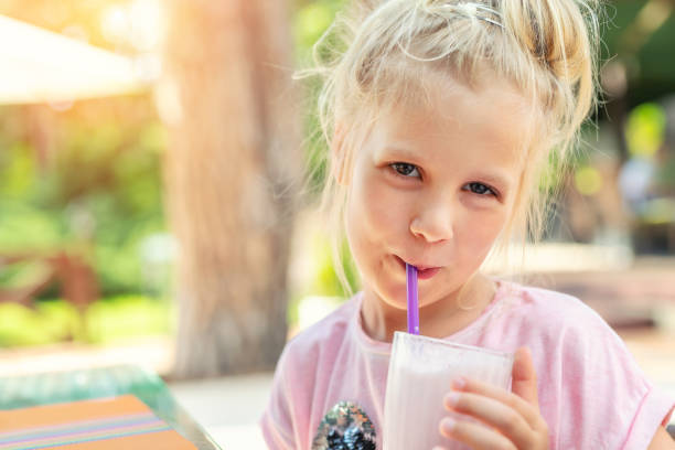 Adorable Cute Preschooler Caucasian Blond Girl Portrait Sipping Fresh Tasty  Strawberry Milkshake Coctail At Cafe Outdoors Children Healthy Diet And  Nutrtion Concept Stock Photo - Download Image Now - iStock