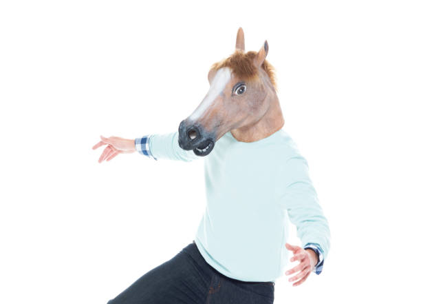 istock Man with horse mask is being silly 1161827667
