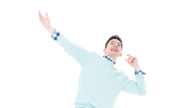 istock Handsome young man looking up in surprise 1161827802
