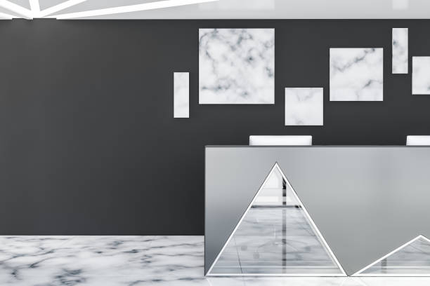 istock Gray and glass reception desk in black office 1161827933