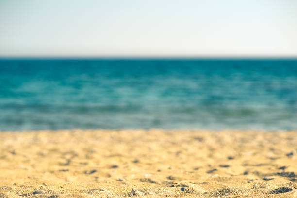 istock close up of a wave rolling onto the beach 1161839642