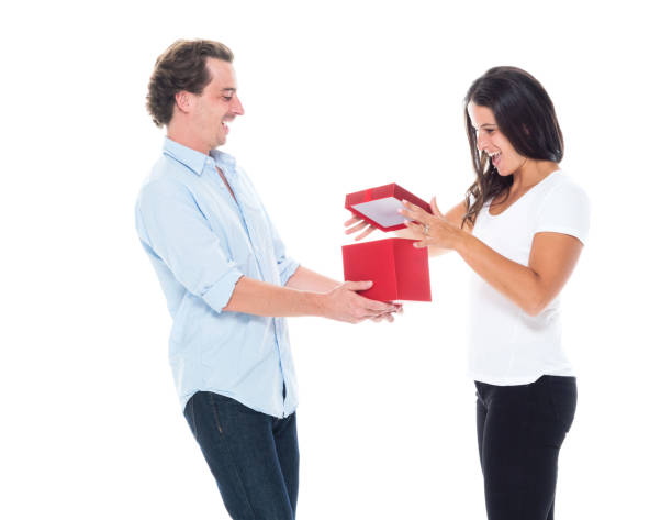 istock Husband giving a gift to his wife 1161839753