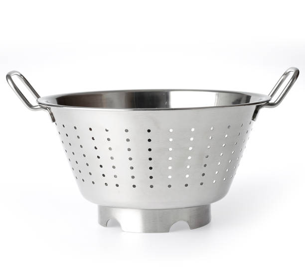 istock Stainless steel colander isolated on white background. 1161841707