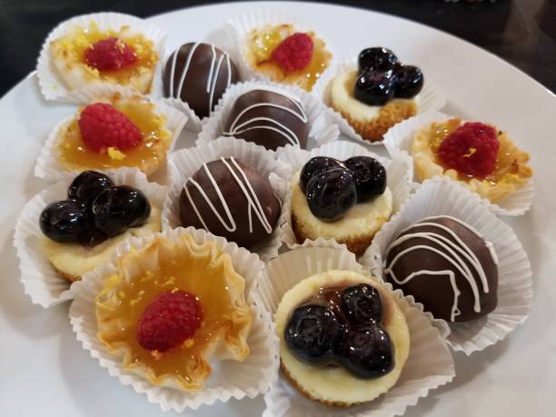 istock Petit fours appetizing miniature pastries dessert plate 1161843680