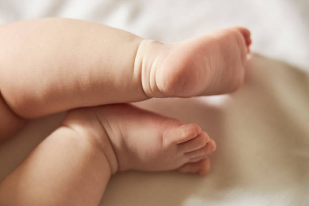 istock Feets Of Little Baby 1161845425