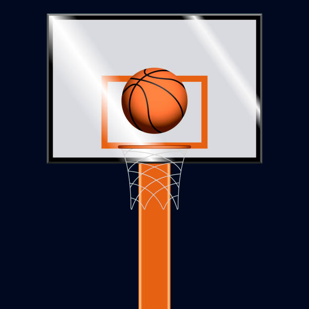 istock Basketball ball on a basketball hoop 1161845516