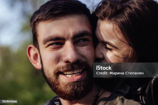 Head Shot Of Young Affectionate Romantic Couple In Love Close Up Portrait Of Attractive Brunette Girl And Guy With Eyes Closed Close To Each Other Concept Of First Kiss Tenderness And Amorousness Stock Photo - Download Image Now
