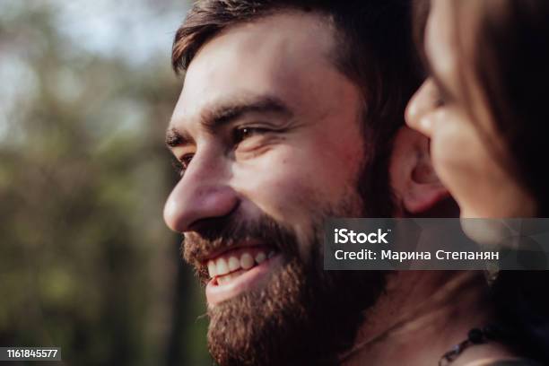 Head Shot Of Young Affectionate Romantic Couple In Love Close Up Portrait Of Attractive Brunette Girl And Guy With Eyes Closed Close To Each Other Concept Of First Kiss Tenderness And Amorousness Stock Photo - Download Image Now